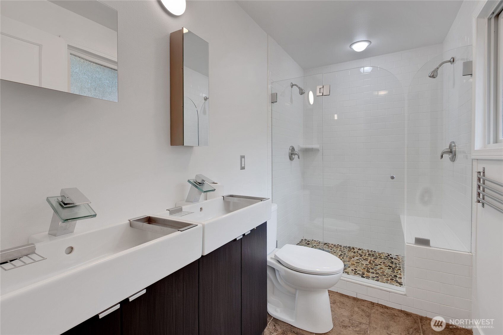 2356 South Angeline Street Seattle, WA 98108 - Photo 15 of 35 a bathroom with a sink a toilet and shower