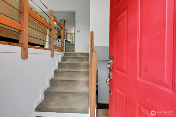 a view of entryway with a front door