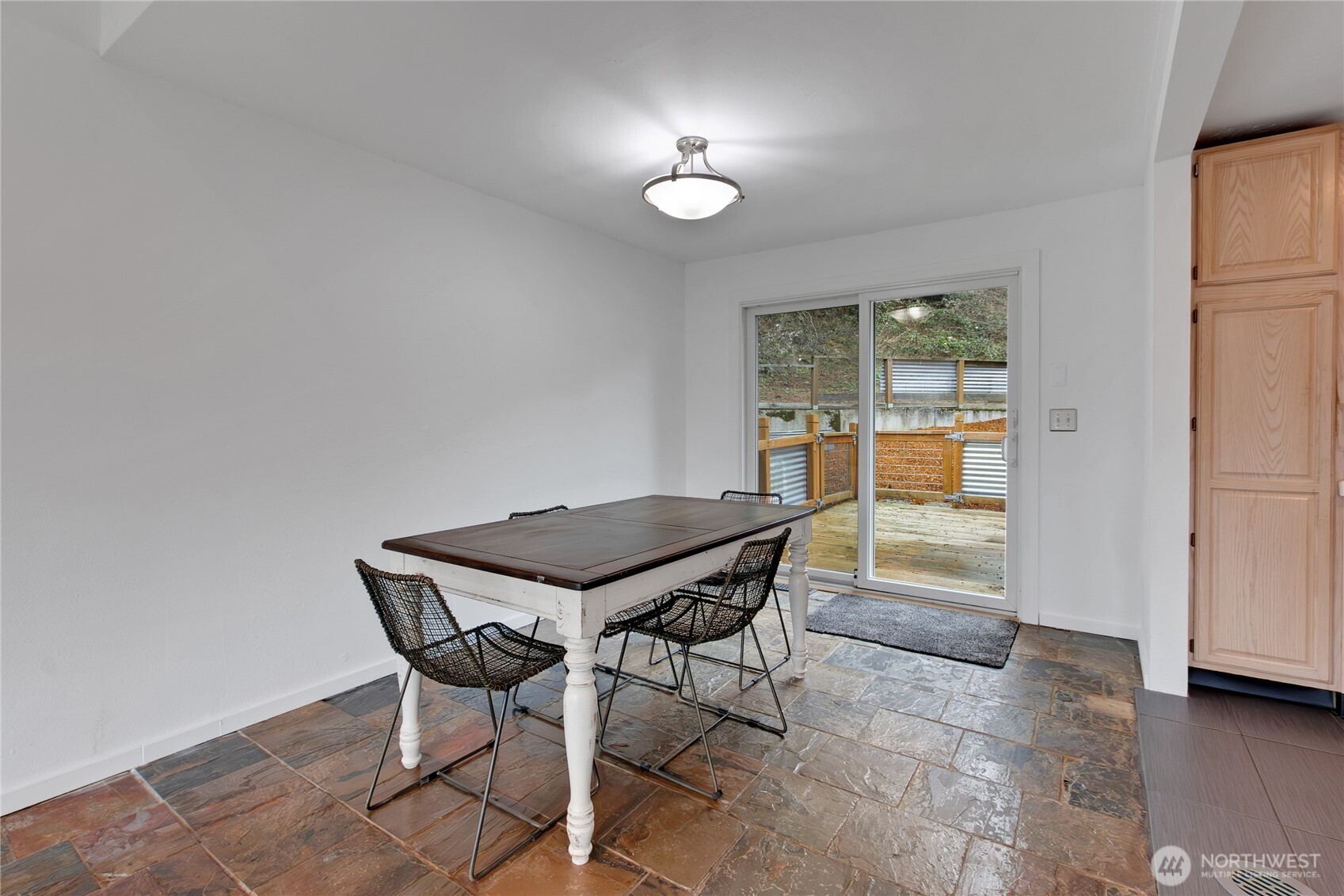 2356 South Angeline Street Seattle, WA 98108 - Photo 5 of 35 a view of a dining room with furniture and a window