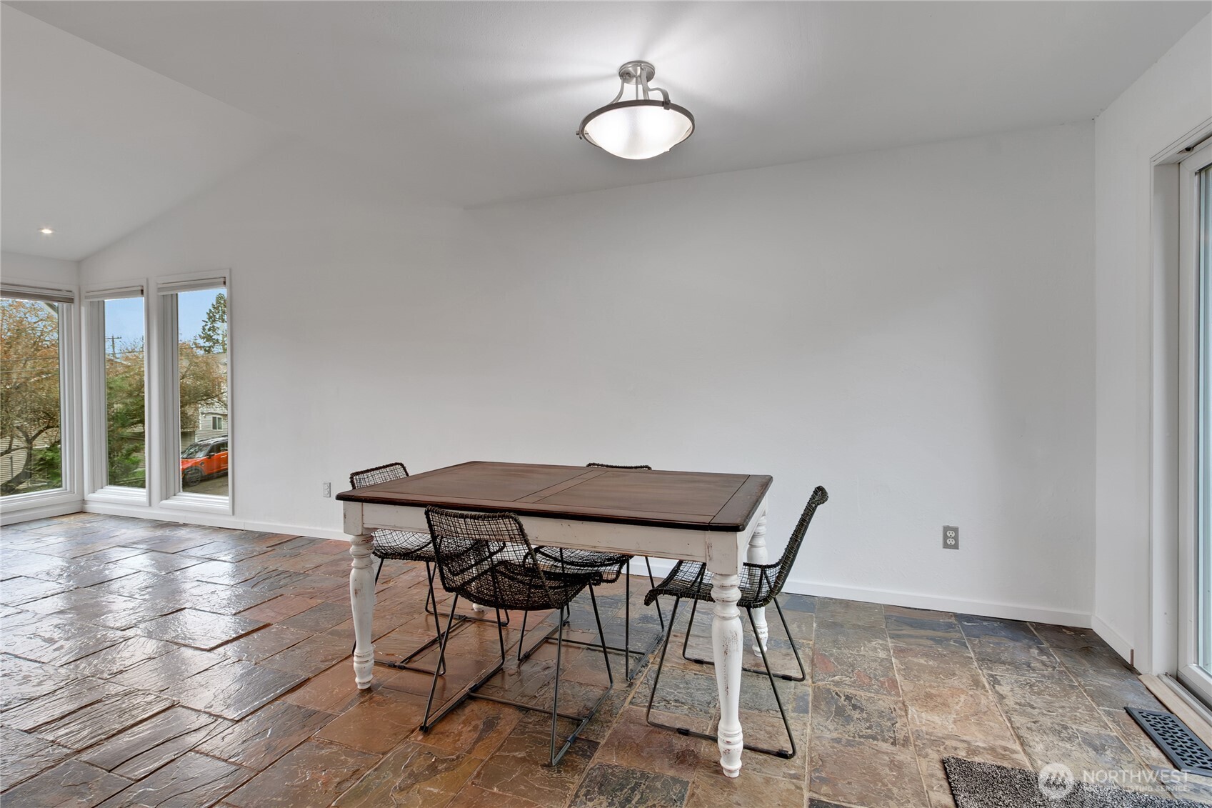 2356 South Angeline Street Seattle, WA 98108 - Photo 8 of 35 a view of a dining room with furniture and wooden floor