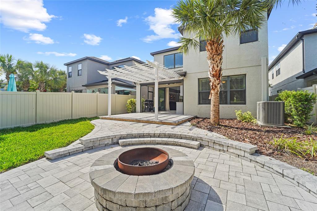 8903 Arabella Lane Seminole, FL 33777 - Photo 2 of 47 a view of a house with backyard and sitting area