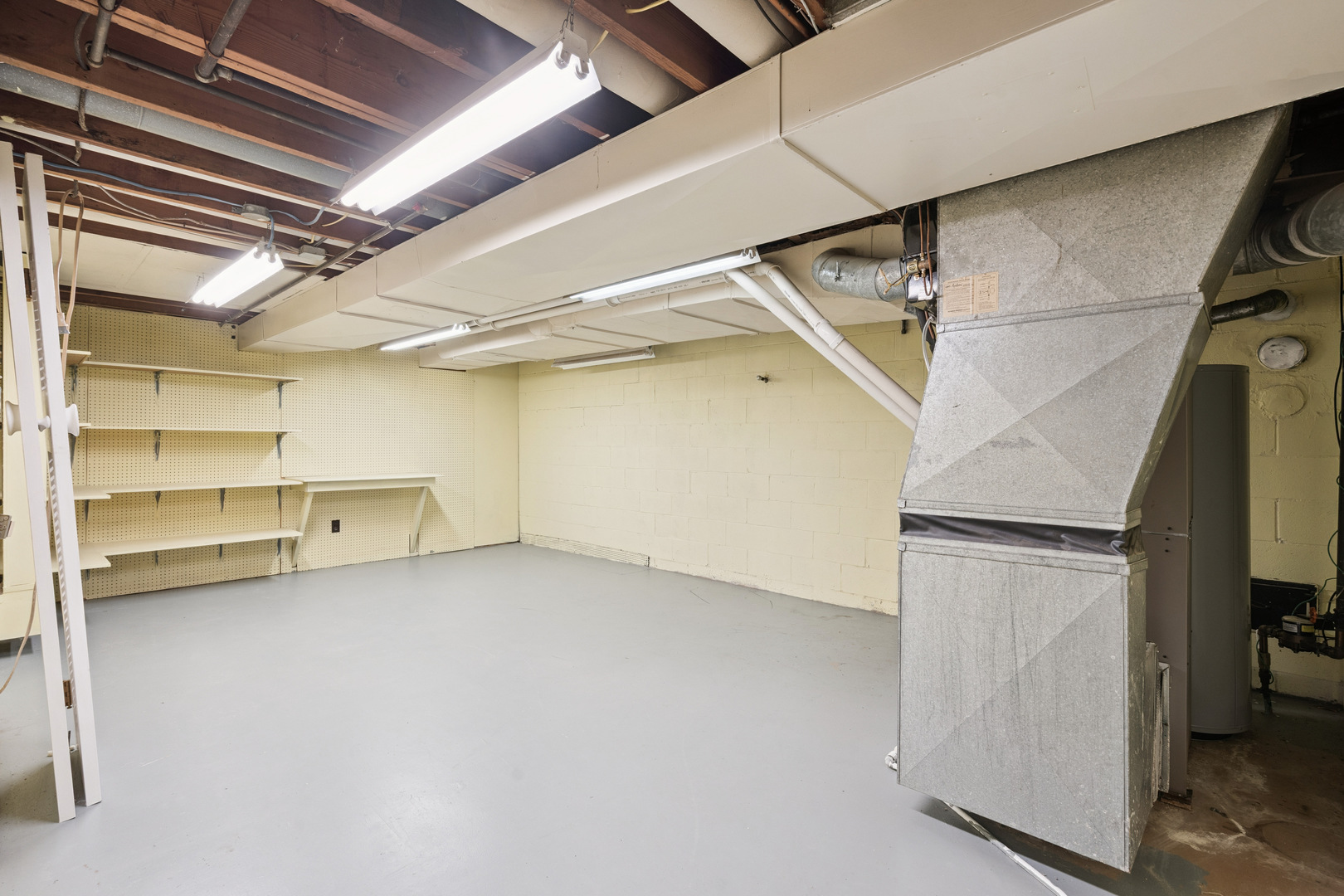 3104 15th Street A Moline, IL 61265 - Photo 13 of 31 a view of a room with storage and utility