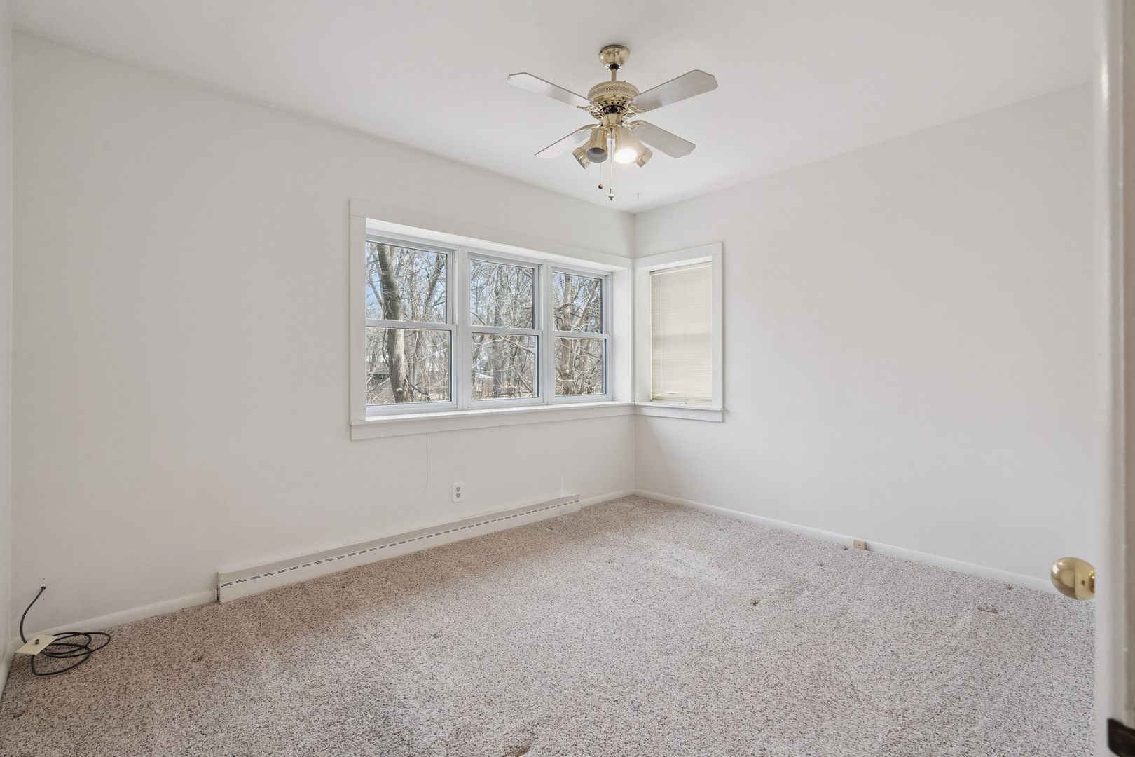 3104 15th Street A Moline, IL 61265 - Photo 20 of 31 an empty room with a window