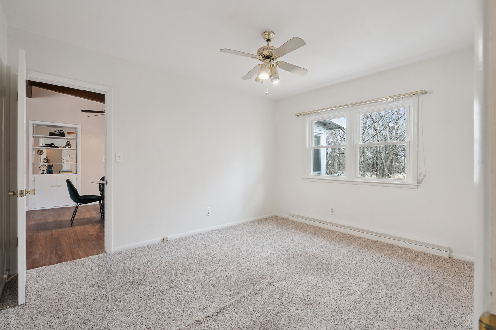 3104 15th Street A Moline, IL 61265 - Photo 22 of 31 a view of an empty room with a window