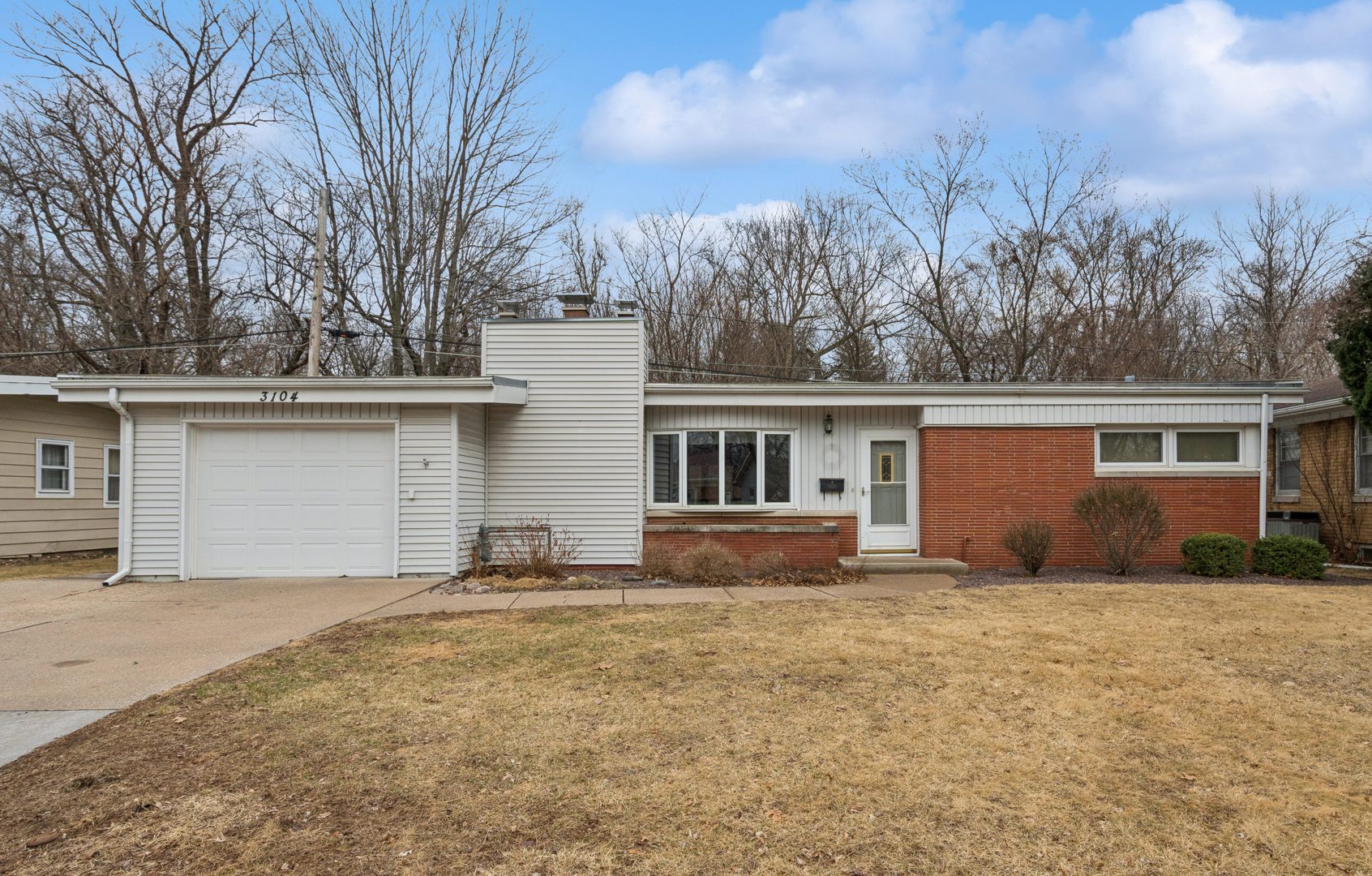 3104 15th Street A Moline, IL 61265 - Photo 26 of 31 a house that has a tree in front of it