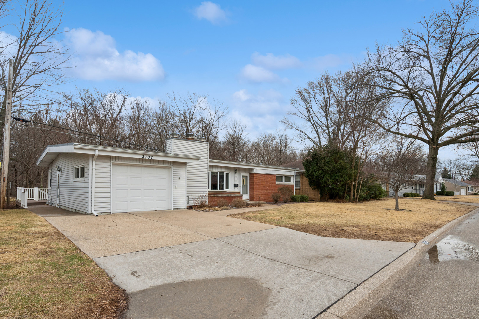 3104 15th Street A Moline, IL 61265 - Photo 27 of 31 a view of an house with backyard and trees