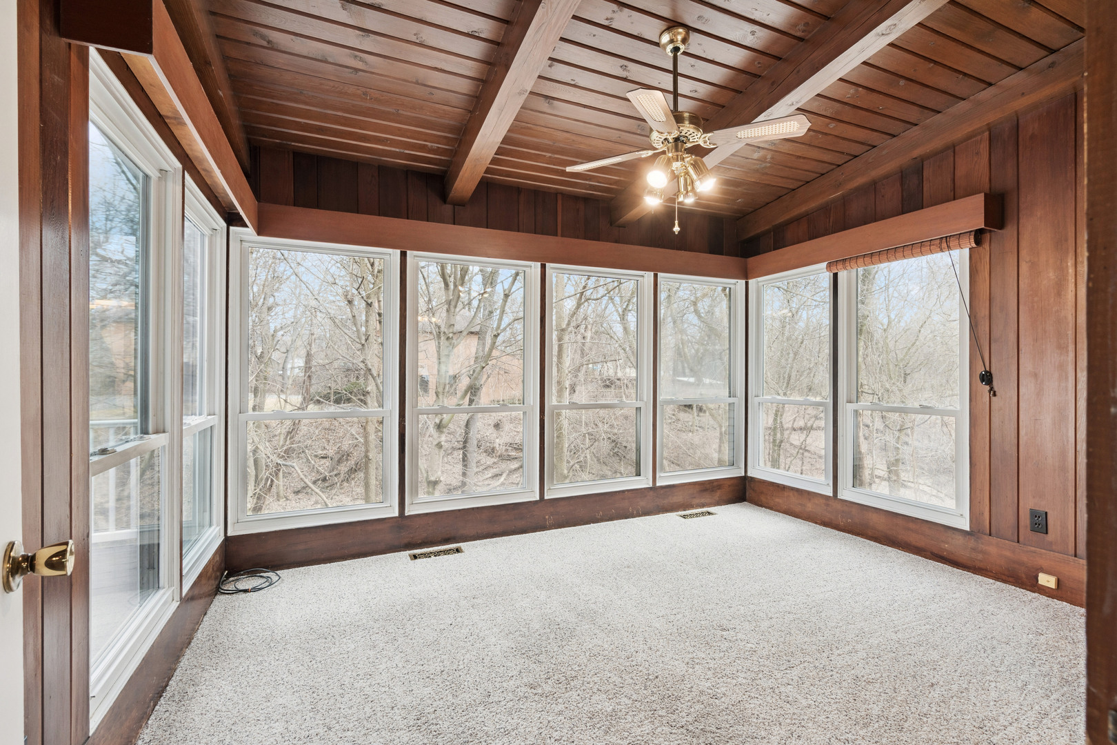 3104 15th Street A Moline, IL 61265 - Photo 5 of 31 a view of an empty room with windows