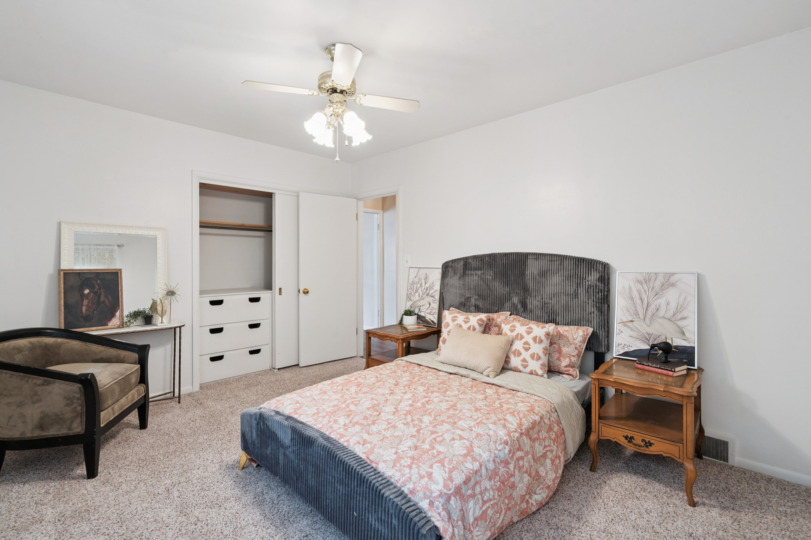 3104 15th Street A Moline, IL 61265 - Photo 10 of 31 a bedroom with furniture and a chandelier