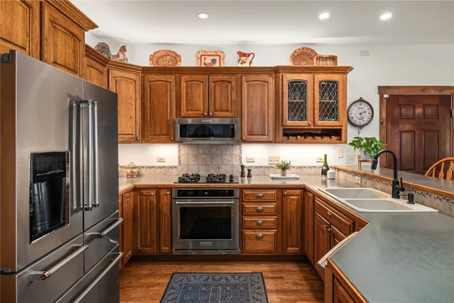 a living room with furniture a fireplace and a table