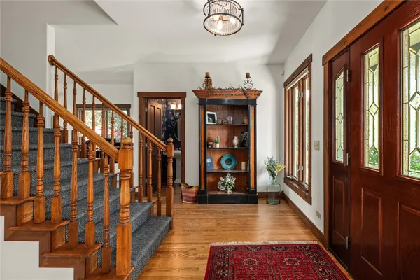 a living room with fireplace furniture and a flat screen tv
