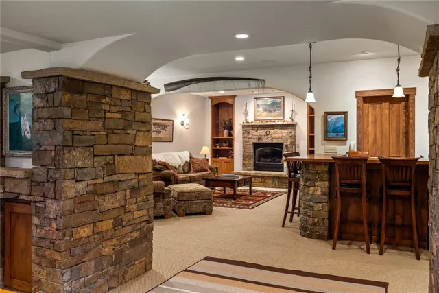 a view of a dining room furniture and a chandelier