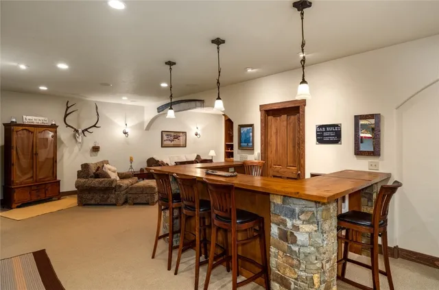 a dinning table and chairs in a kitchen