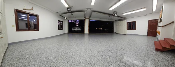 a view of a livingroom with furniture and window