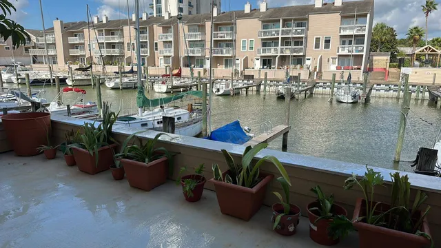 a view of swimming pool from a balcony