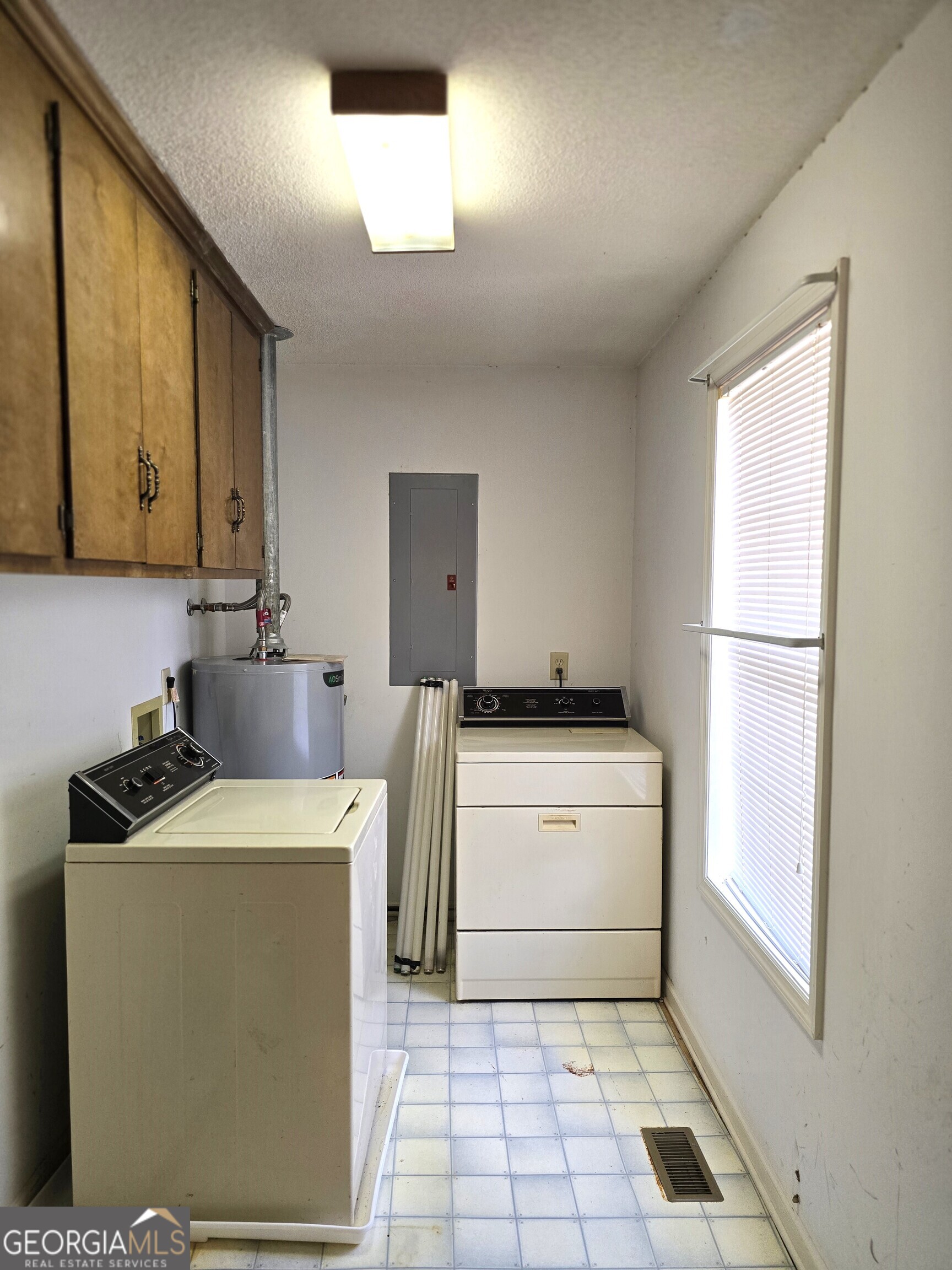 2096 Old Quaker Road Wrens, GA 30833 - Photo 16 of 23 a utility room with dryer and washer