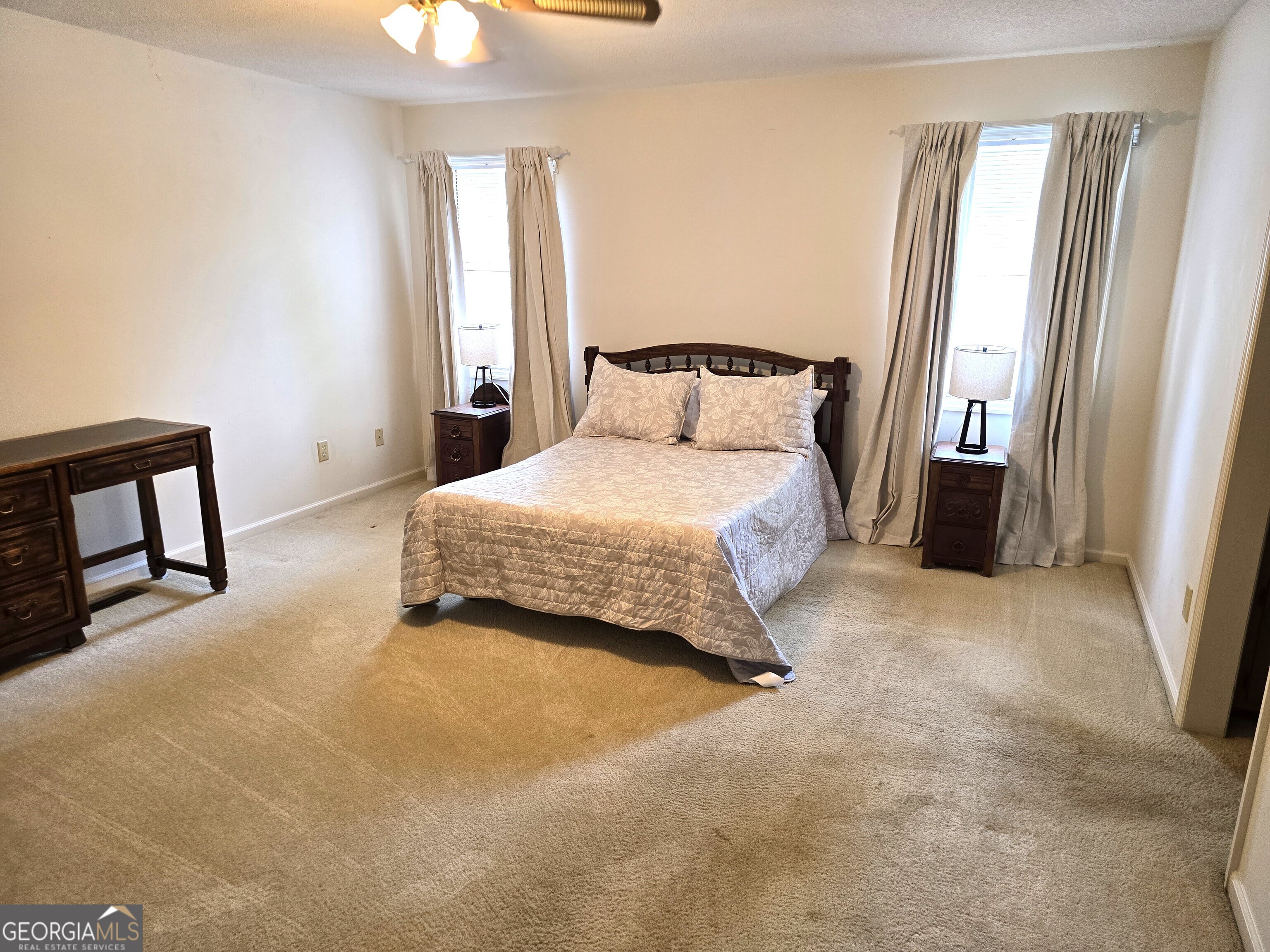 2096 Old Quaker Road Wrens, GA 30833 - Photo 22 of 23 a bedroom with a bed and a window