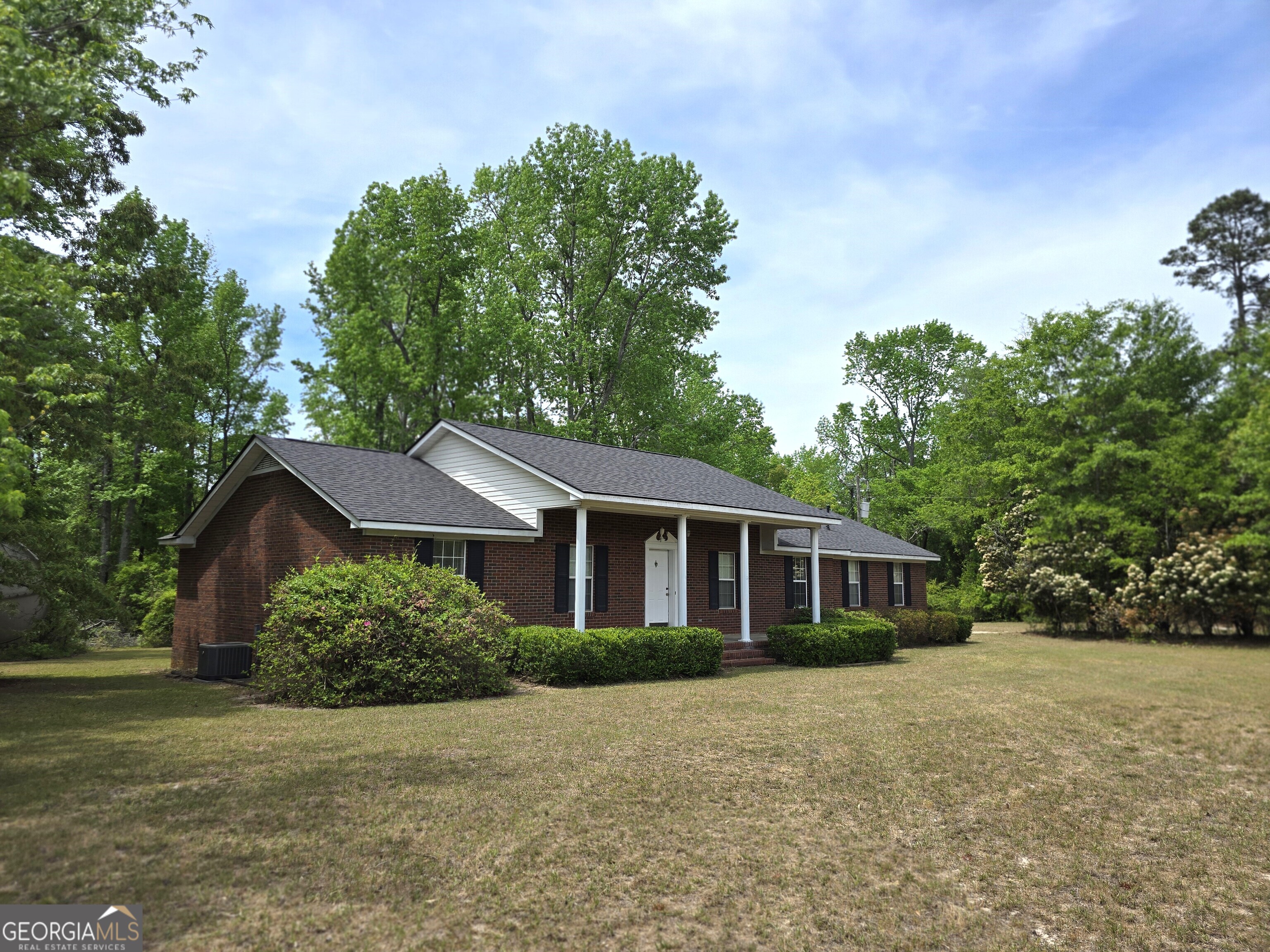 2096 Old Quaker Road Wrens, GA 30833 - Photo 3 of 23 a house with trees in the background