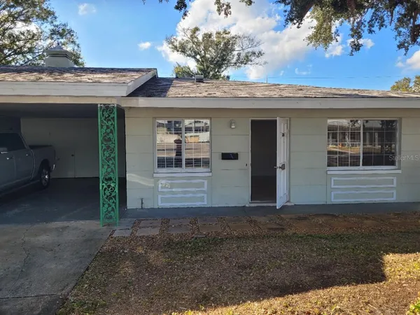 a view of a house with a porch