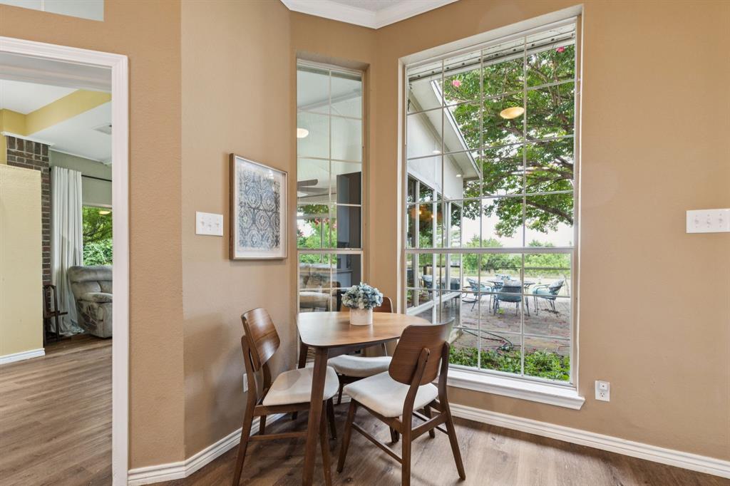 13768 Stirrup Court Forney, TX 75126 - Photo 8 of 32 a dining room with furniture and windows