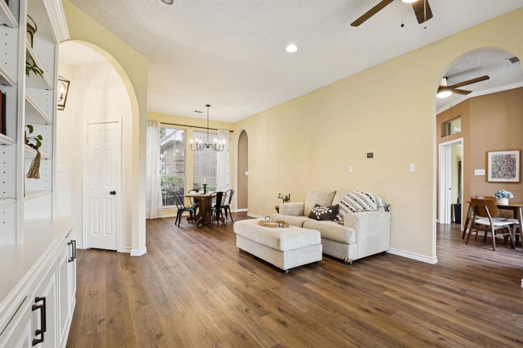 13768 Stirrup Court Forney, TX 75126 - Photo 10 of 32 a living room with furniture and a large window