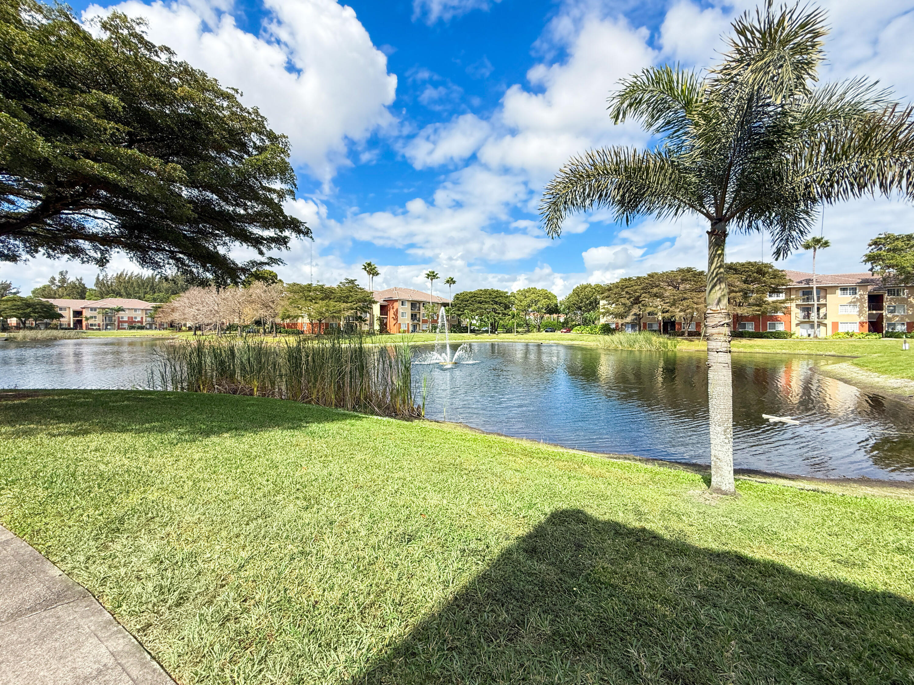 4155 Haverhill Road, Unit 1420 West Palm Beach, FL 33417 - Photo 18 of 19 Walking/Jogging Path by Lake