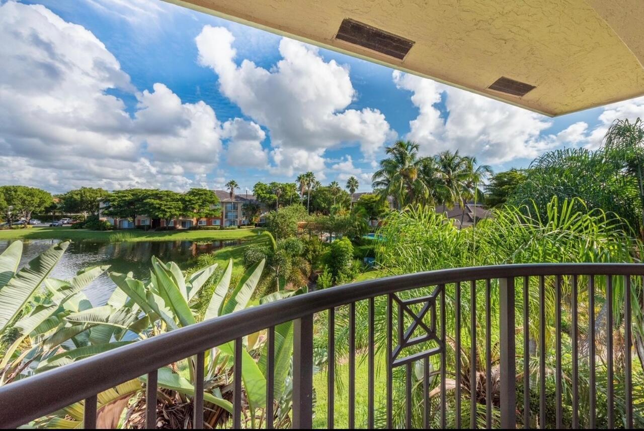 4155 Haverhill Road, Unit 1420 West Palm Beach, FL 33417 - Photo 5 of 19 4155 covered patio