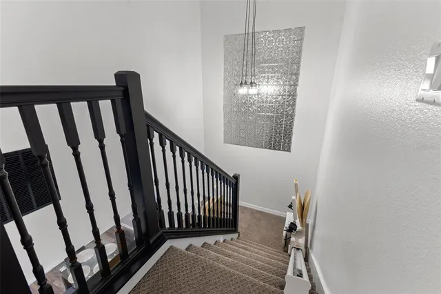 a view of a balcony with wooden floor
