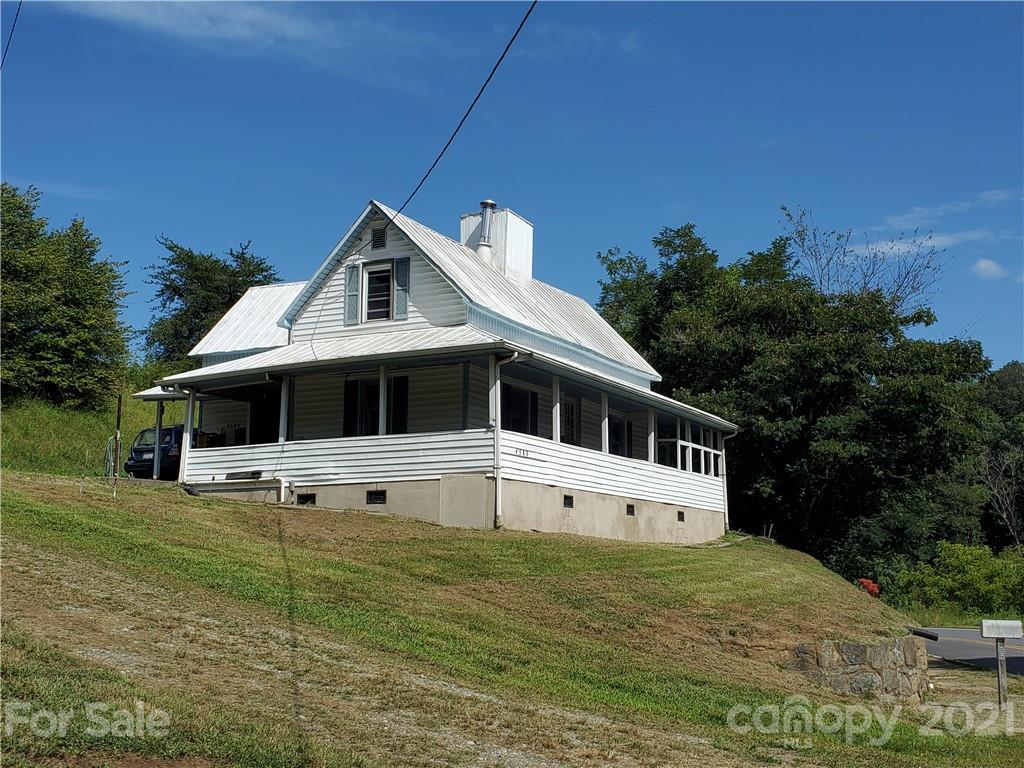 4580 Little Pine Road Marshall, NC 28753 - Photo 24 of 39 a front view of a house with a yard