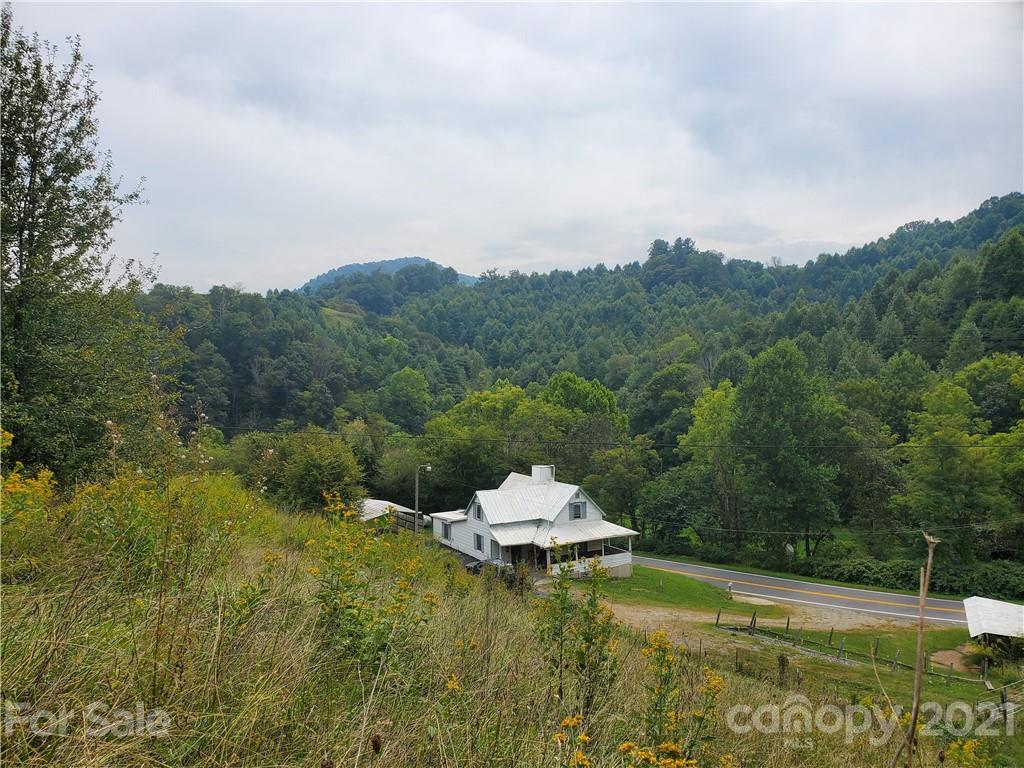4580 Little Pine Road Marshall, NC 28753 - Photo 32 of 39 a swimming pool with trees in the background