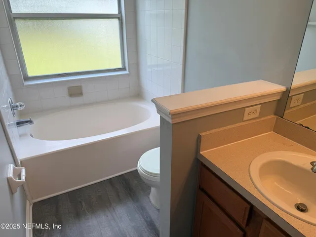 a bathroom with a sink and a toilet