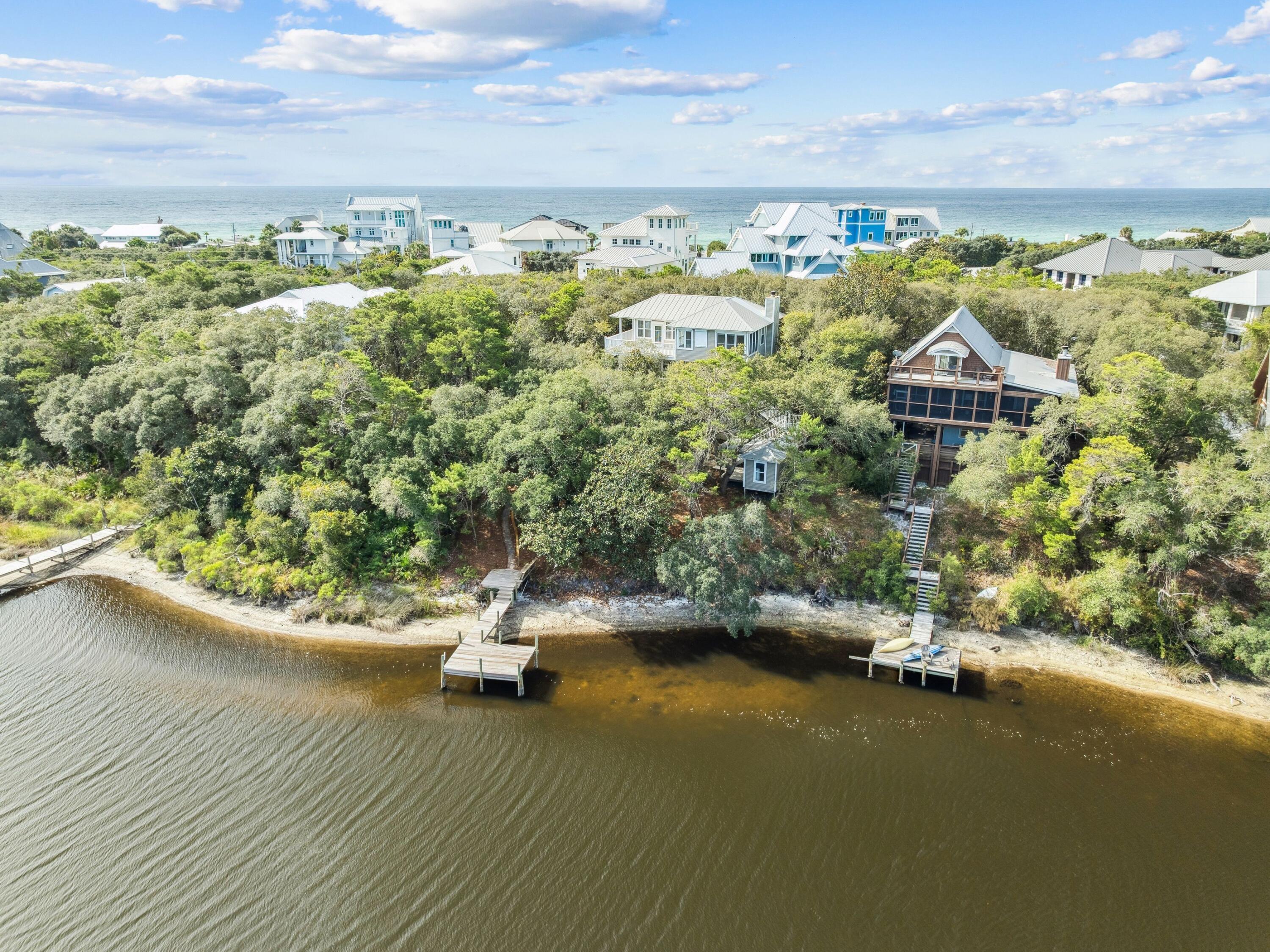 219 Blue Lake Road Santa Rosa Beach, FL 32459 - Photo 6 of 11 an aerial view of residential houses with outdoor space