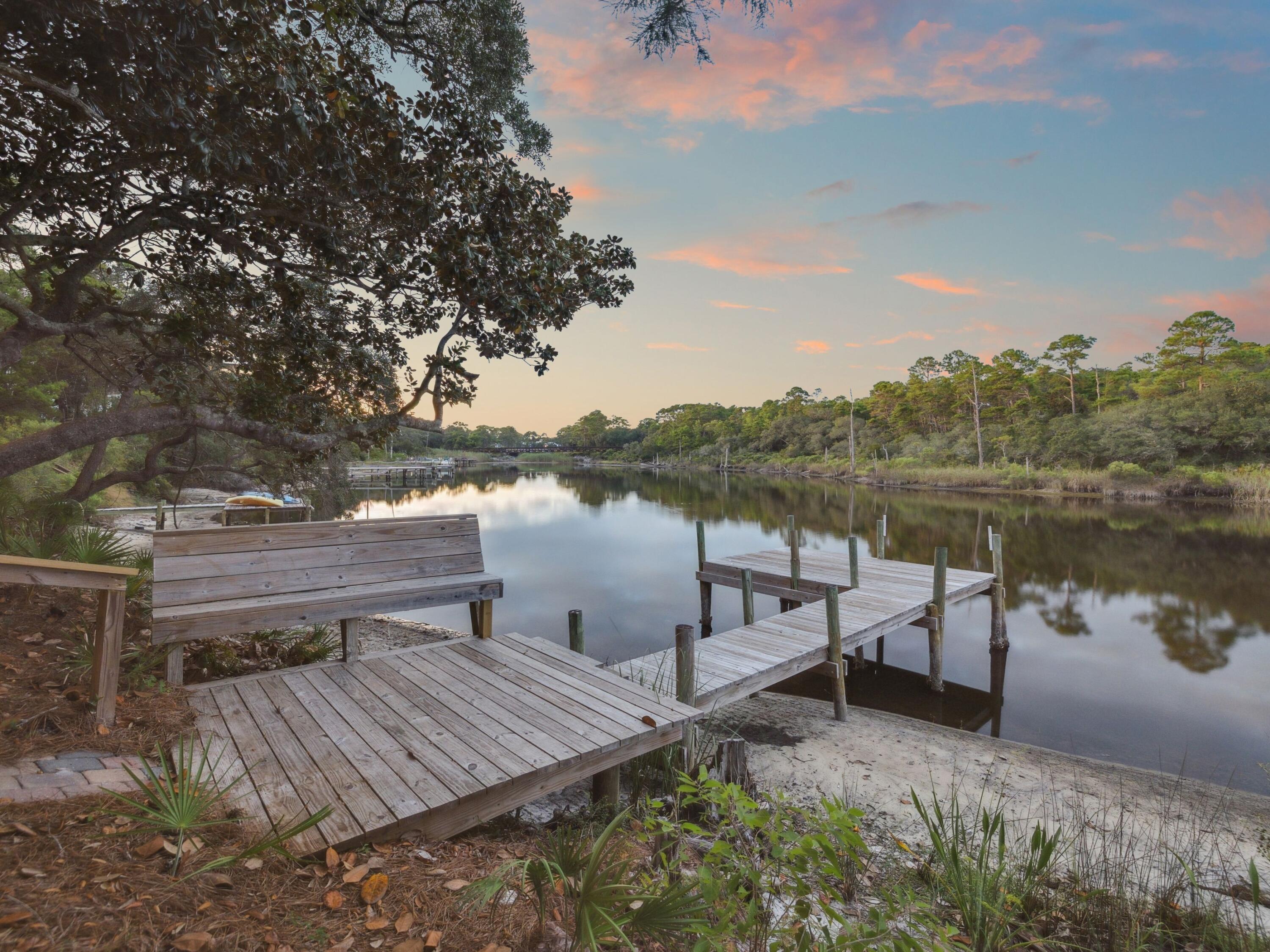 219 Blue Lake Road Santa Rosa Beach, FL 32459 - Photo 7 of 11 a view of a lake with sitting area