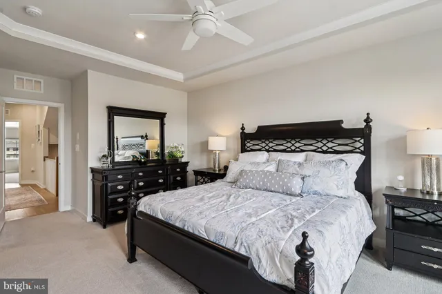 a view of a storage & utility room with dryer and washer