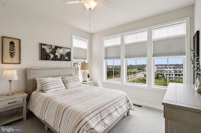 a front view of a building with retail shops