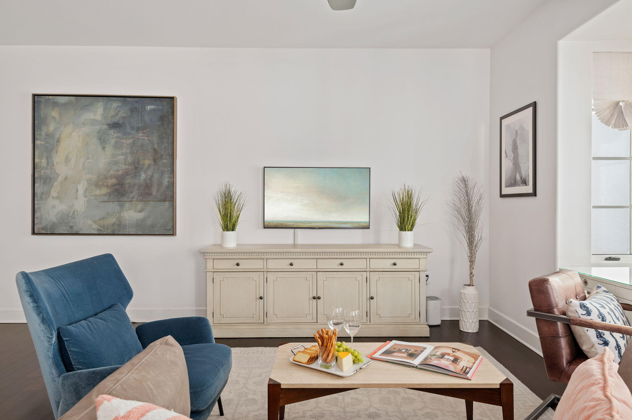 18 West Victoria Street, Unit 303 Santa Barbara, CA 93101 - Photo 13 of 42 a living room with furniture and a couch