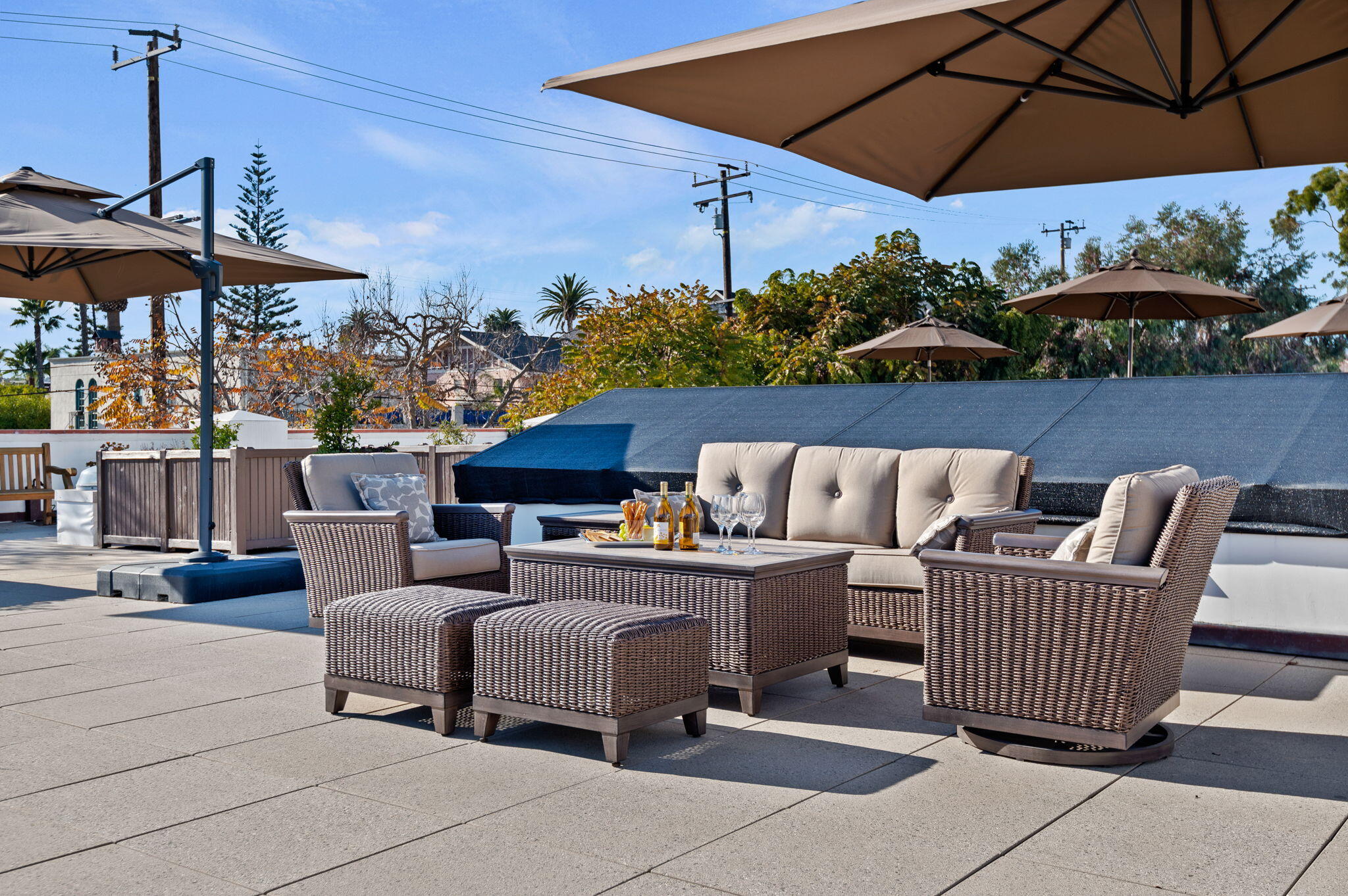 18 West Victoria Street, Unit 303 Santa Barbara, CA 93101 - Photo 32 of 42 a patio with a patio table and chairs