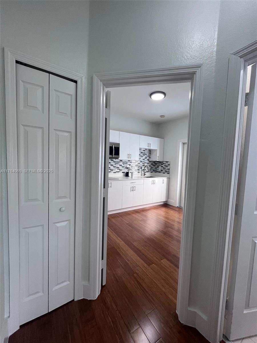 22937 Southwest 9th Avenue, Unit 1 Miami, FL 33170 - Photo 9 of 19 a view of kitchen with wooden floor