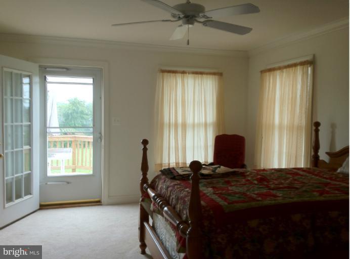 13228 Chestnut Fork Road Culpeper, VA 22701 - Photo 7 of 17 Master Bedroom with access to rear deck.