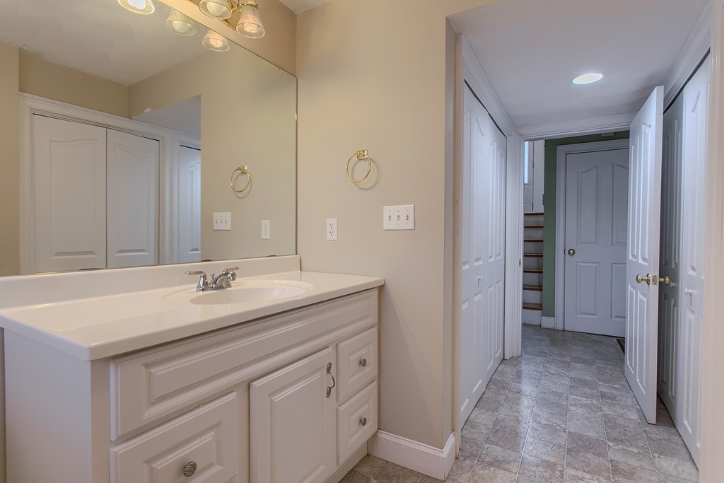 918 Boston Road Billerica, MA 01821 - Photo 16 of 16 a bathroom with a sink and a mirror