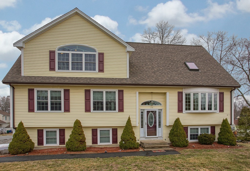 918 Boston Road Billerica, MA 01821 - Photo 3 of 16 a front view of a house with a yard