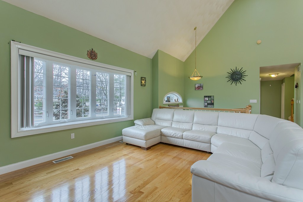 918 Boston Road Billerica, MA 01821 - Photo 9 of 16 a living room with furniture and a large window