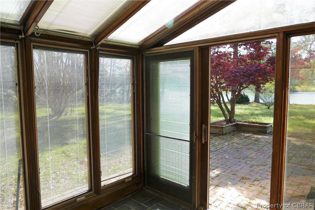 895 Holly Point Road Mathews, VA 23109 - Photo 19 of 47 a view of a room that has a large window