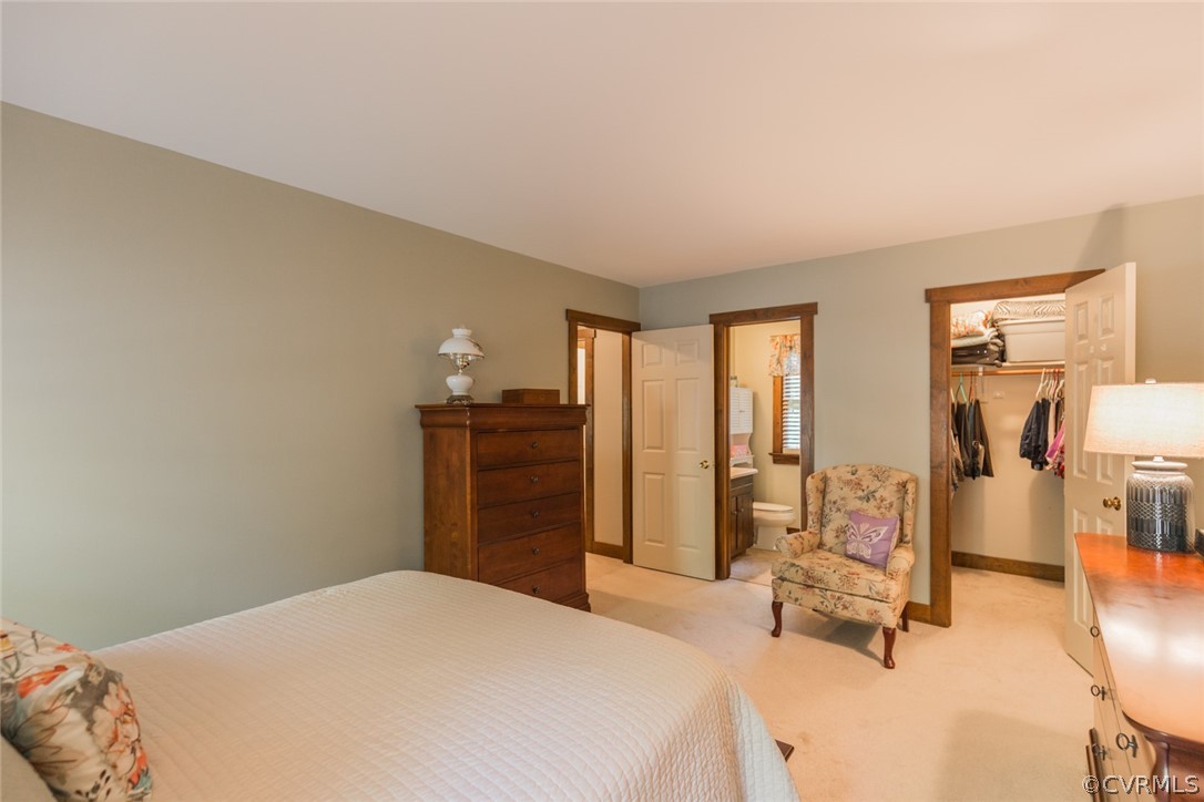 10319 Natural Bridge Road Chesterfield, VA 23236 - Photo 13 of 25 a bedroom with a bed and wooden floor
