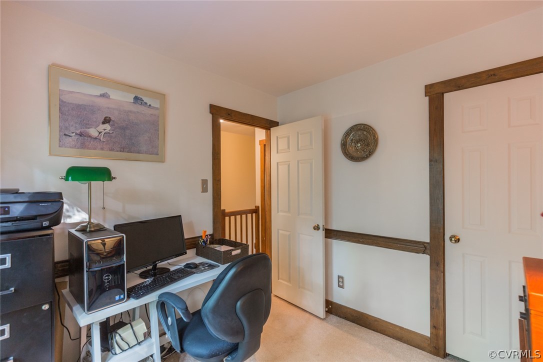 10319 Natural Bridge Road Chesterfield, VA 23236 - Photo 18 of 25 a view of a workspace with furniture and a window