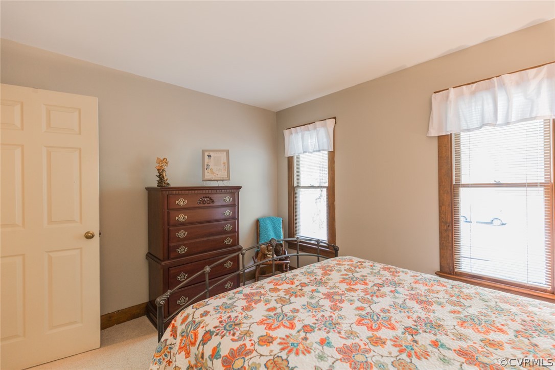 10319 Natural Bridge Road Chesterfield, VA 23236 - Photo 20 of 25 a bed room with a bed and a window