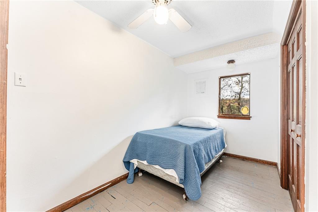 162 Big Dog Road Waynesburg, PA 15370 - Photo 16 of 50 a bedroom with a bed and a window