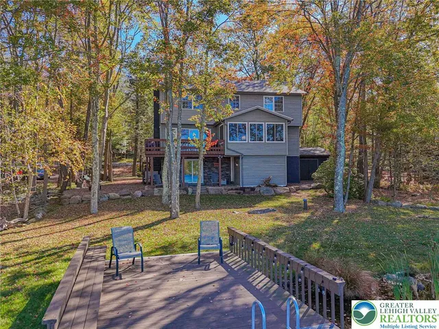 a view of a street with a building in the background