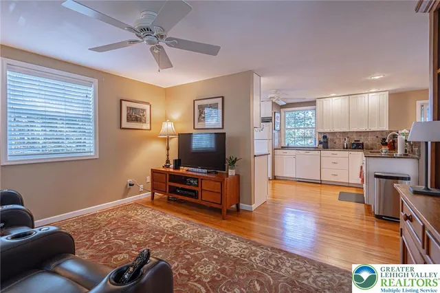 a bedroom with a bed and a mirror