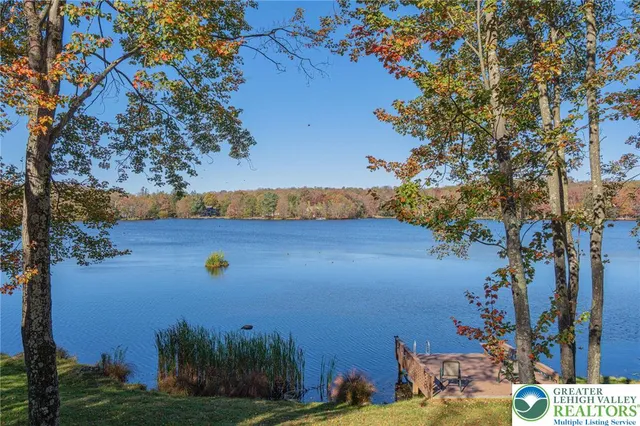 a view of a trees in front of a house