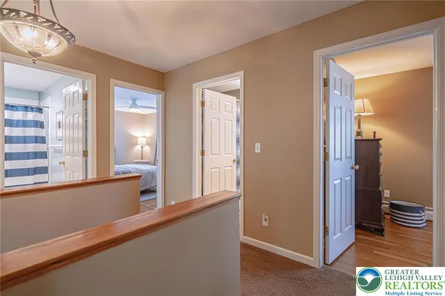 a bathroom with a sink toilet and a mirror